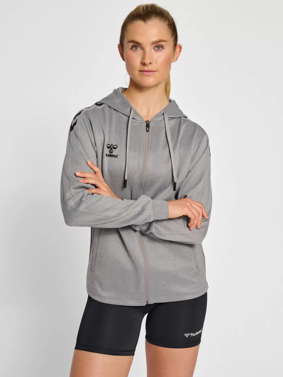 hmlCORE XK POLY ZIP HOOD SWEAT WOMA*hummel Online