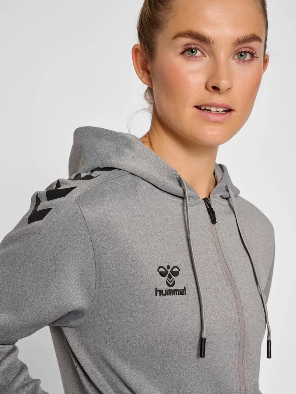 hmlCORE XK POLY ZIP HOOD SWEAT WOMA*hummel Online
