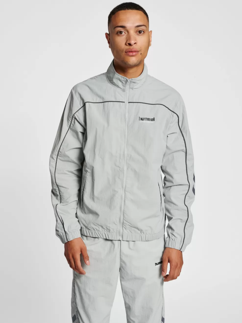 hmlLGC CELAB WOV ZIP JACKET*hummel Clearance